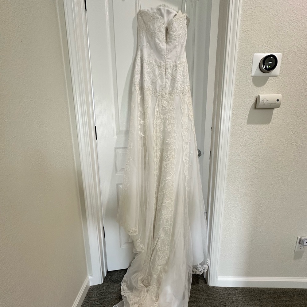 Pronovias India wedding dress with lace shrug size 8 NWT. Garment bag included.